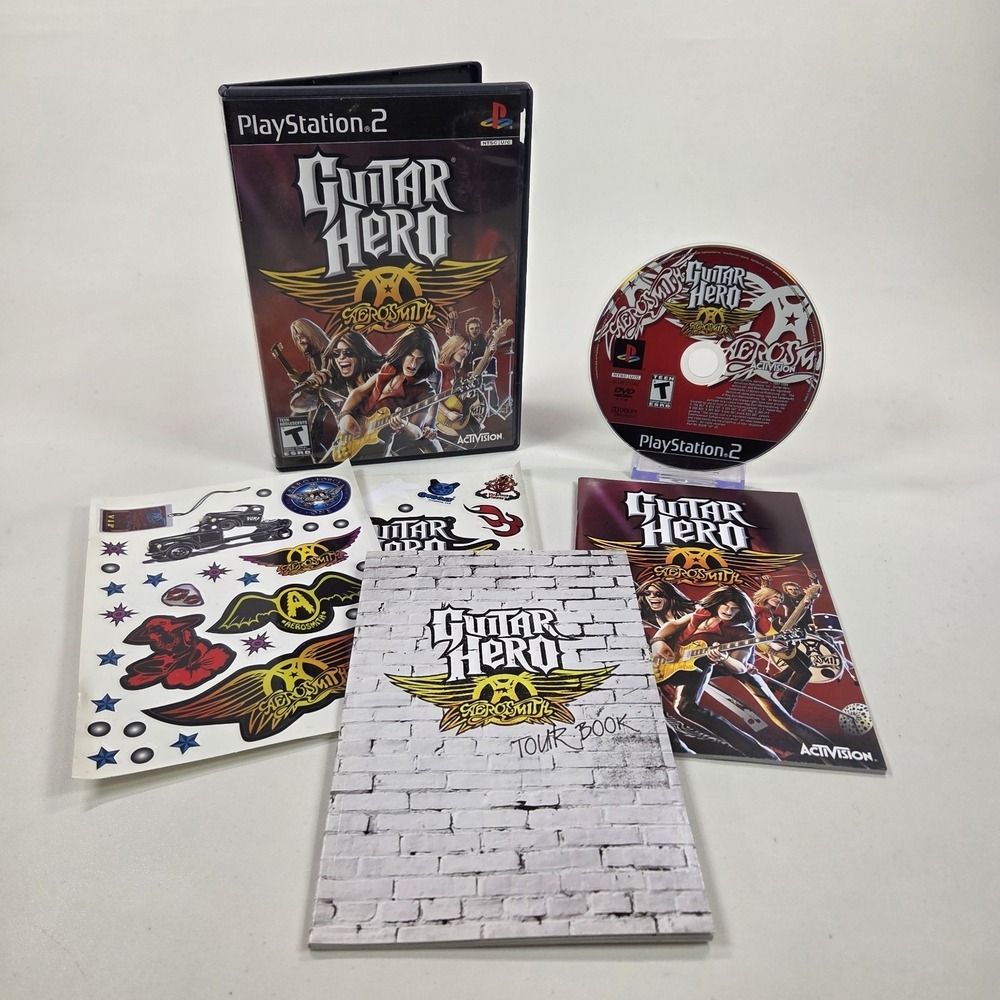 Guitar‎ Hero Aerosmith Sony PS2 w/ Tour Book + Manual + Stickers - Tested